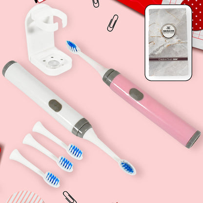 12712 Adult Waterproof Electric Toothbrush Strong Sonic Charging with 4 Toothbrush Head and a toothbrush holder